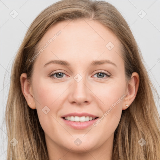 Joyful white young-adult female with long  brown hair and grey eyes