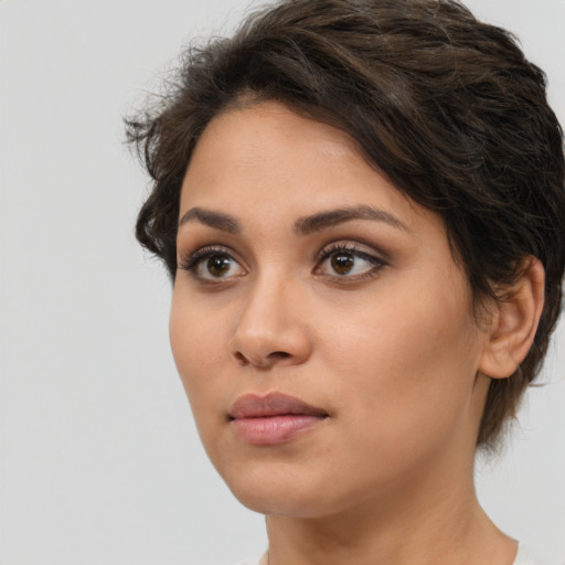 Neutral white young-adult female with short  brown hair and brown eyes