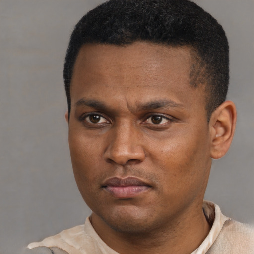 Neutral black young-adult male with short  black hair and brown eyes