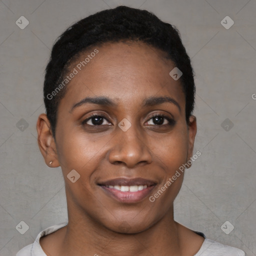 Joyful black young-adult female with short  brown hair and brown eyes