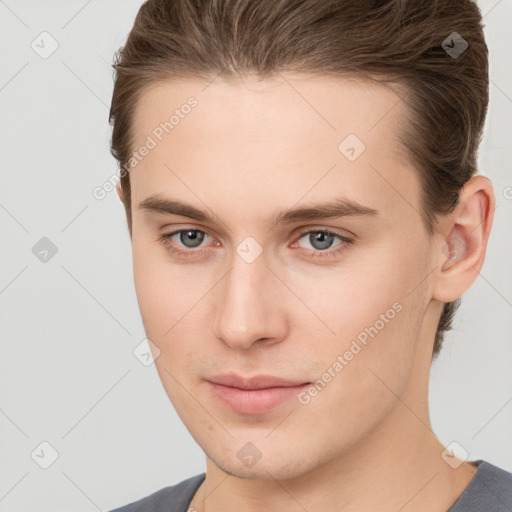 Neutral white young-adult male with short  brown hair and brown eyes