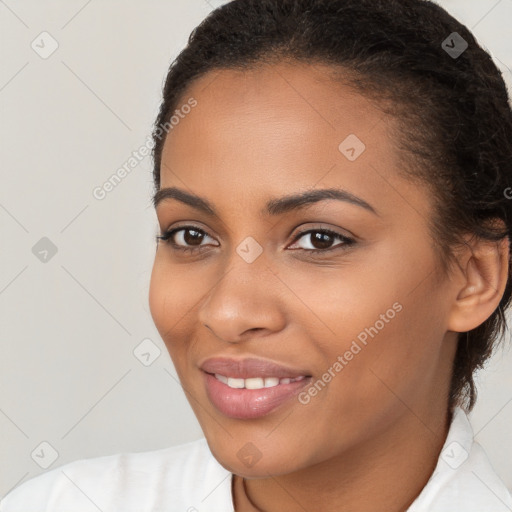 Joyful latino young-adult female with short  brown hair and brown eyes