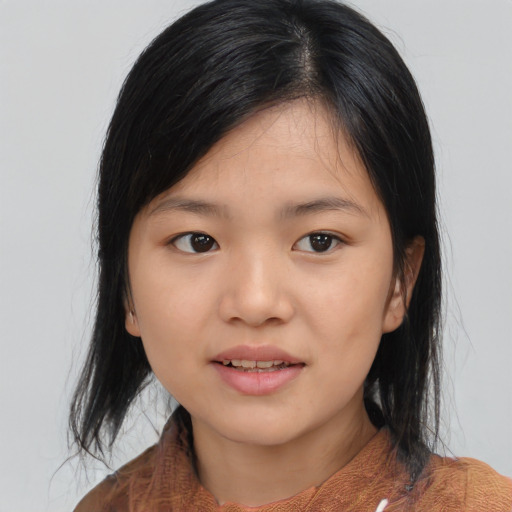 Joyful asian young-adult female with medium  black hair and brown eyes