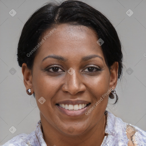 Joyful black adult female with medium  brown hair and brown eyes