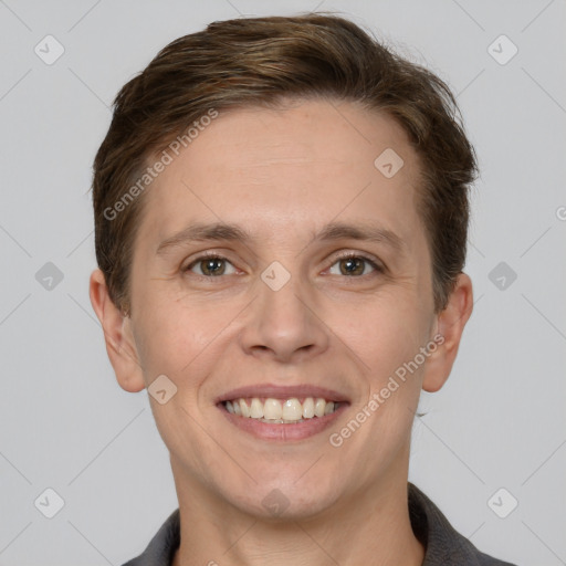 Joyful white young-adult female with short  brown hair and grey eyes