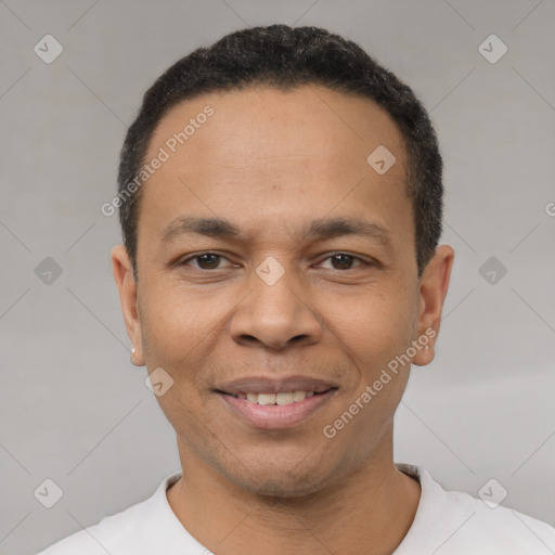 Joyful latino adult male with short  black hair and brown eyes