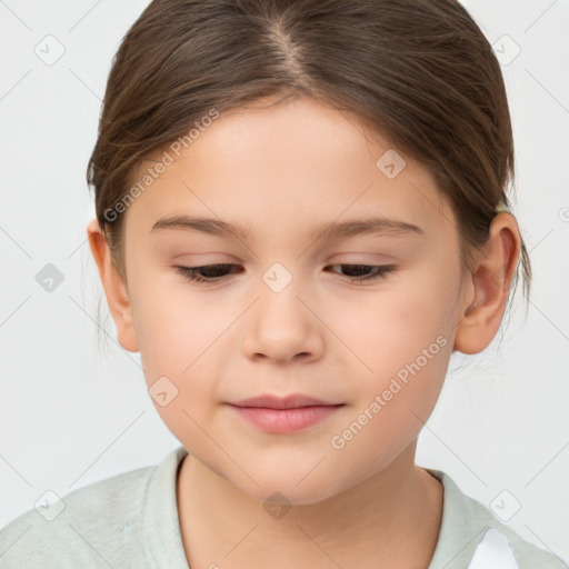 Joyful white child female with short  brown hair and brown eyes