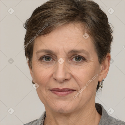 Joyful white adult female with short  brown hair and brown eyes