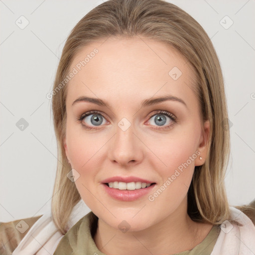 Joyful white young-adult female with medium  brown hair and blue eyes