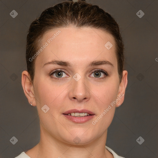 Joyful white young-adult female with short  brown hair and grey eyes