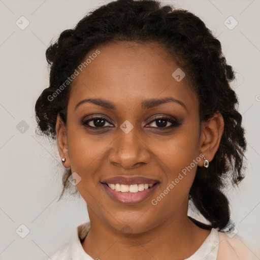 Joyful black young-adult female with medium  brown hair and brown eyes