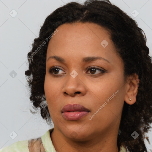 Joyful black young-adult female with medium  black hair and brown eyes