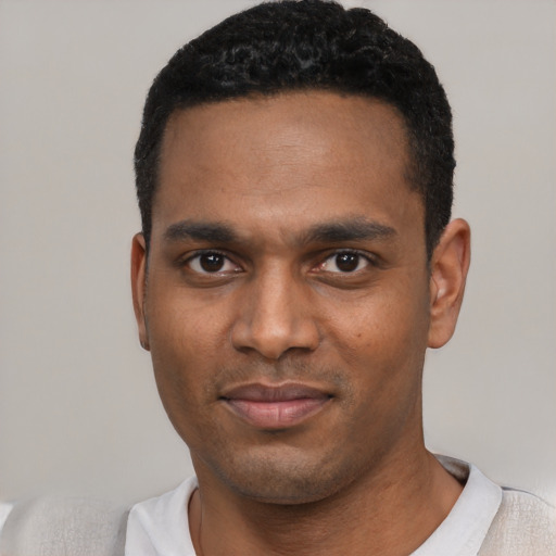 Neutral black young-adult male with short  black hair and brown eyes
