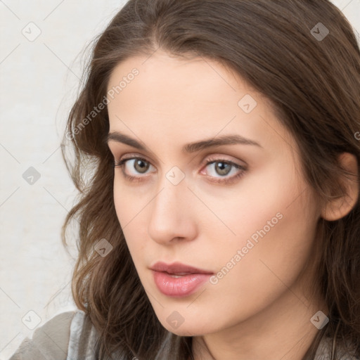 Neutral white young-adult female with long  brown hair and brown eyes