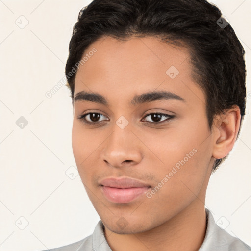 Joyful latino young-adult female with short  brown hair and brown eyes