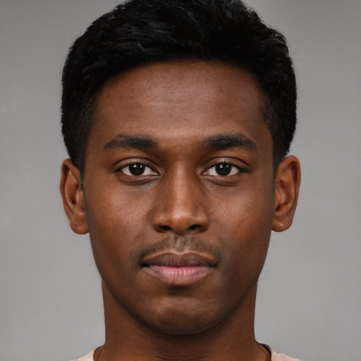 Neutral black young-adult male with short  black hair and brown eyes