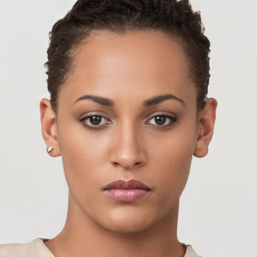 Neutral white young-adult female with short  brown hair and brown eyes