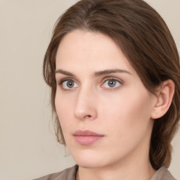 Neutral white young-adult female with medium  brown hair and grey eyes