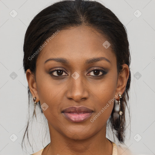 Joyful black young-adult female with medium  brown hair and brown eyes