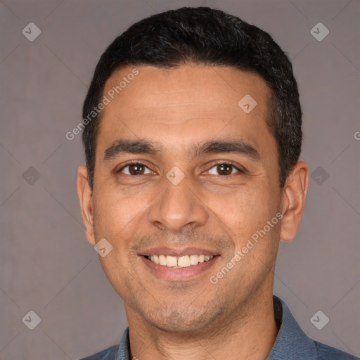 Joyful white young-adult male with short  black hair and brown eyes