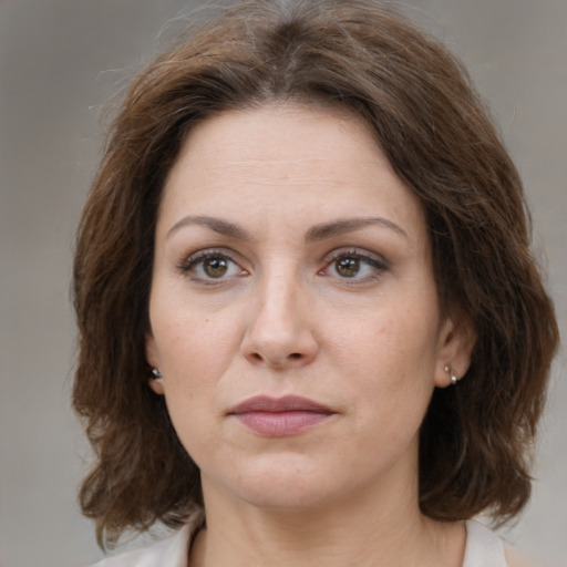 Neutral white adult female with medium  brown hair and brown eyes