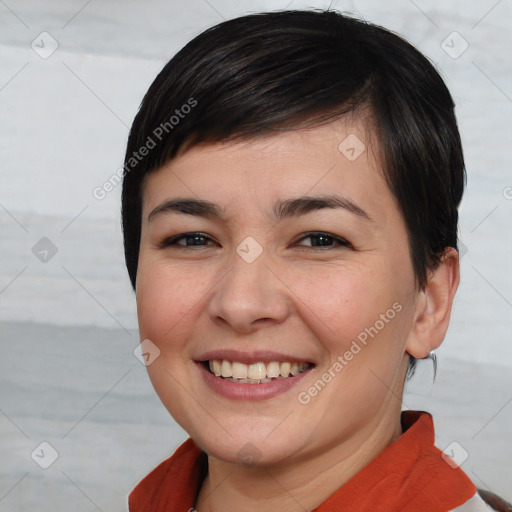 Joyful white young-adult female with short  brown hair and brown eyes