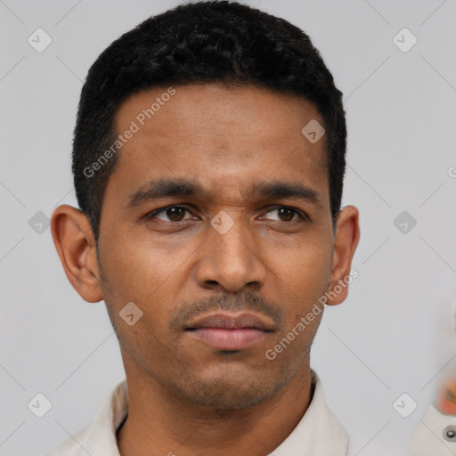 Neutral latino young-adult male with short  black hair and brown eyes