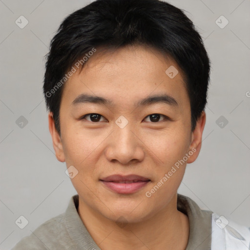 Joyful asian young-adult male with short  black hair and brown eyes