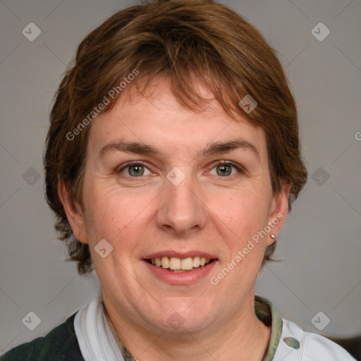 Joyful white adult female with medium  brown hair and grey eyes