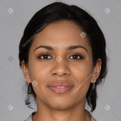 Joyful latino young-adult female with medium  brown hair and brown eyes