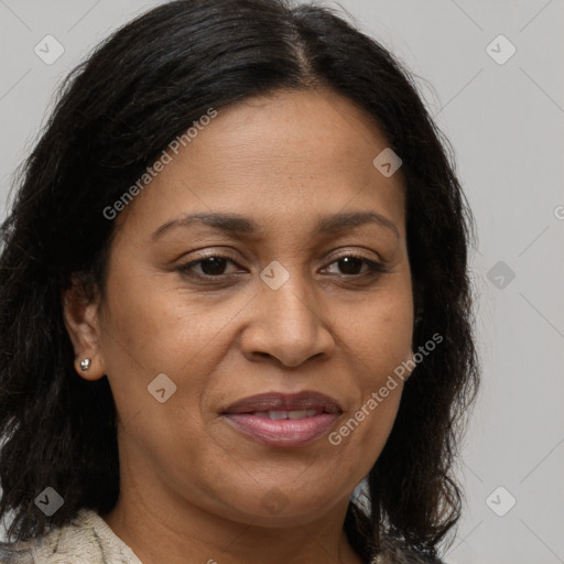 Joyful black adult female with medium  brown hair and brown eyes