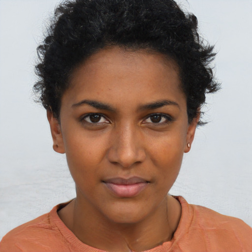 Neutral black young-adult female with short  brown hair and brown eyes