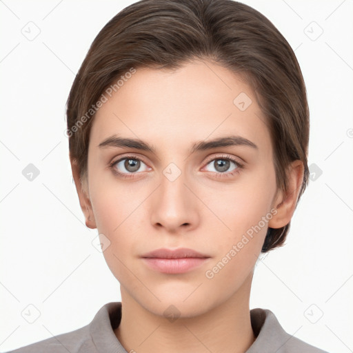 Neutral white young-adult female with short  brown hair and brown eyes