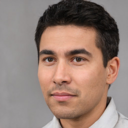 Neutral white young-adult male with short  black hair and brown eyes