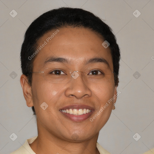 Joyful latino young-adult male with short  brown hair and brown eyes