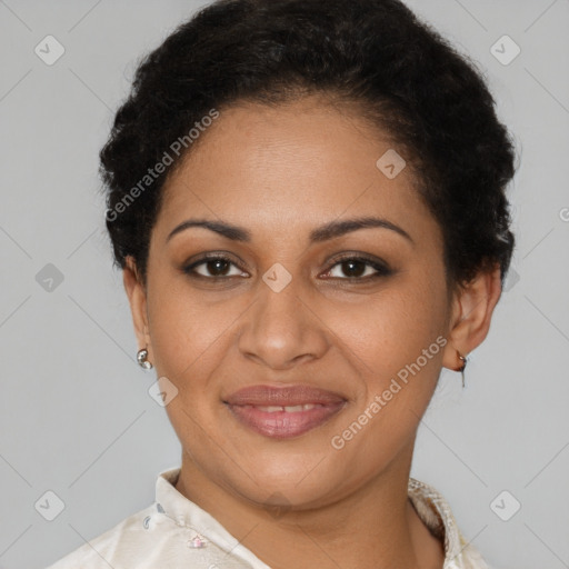 Joyful latino young-adult female with short  brown hair and brown eyes