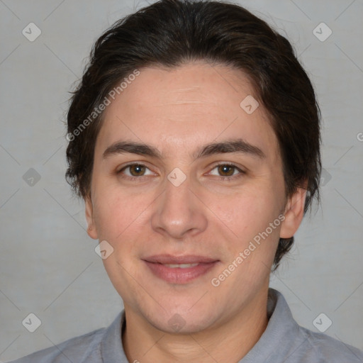 Joyful white adult male with short  brown hair and brown eyes