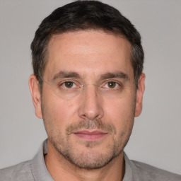Neutral white adult male with short  brown hair and brown eyes