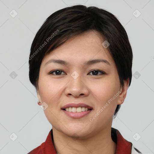 Joyful asian young-adult female with short  brown hair and brown eyes