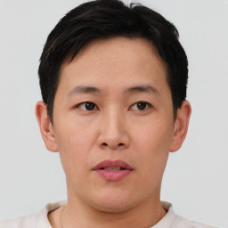 Neutral asian young-adult male with short  brown hair and brown eyes