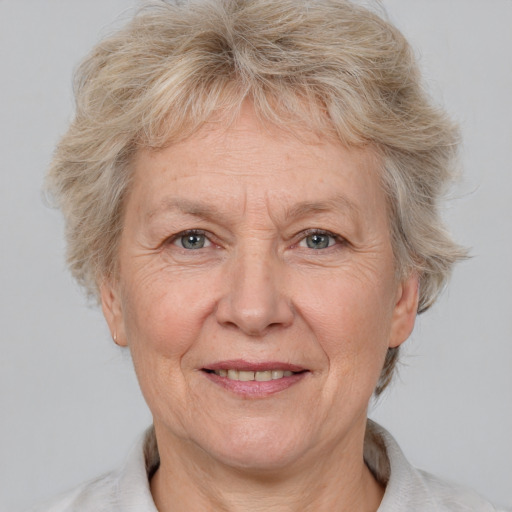 Joyful white middle-aged female with short  brown hair and brown eyes