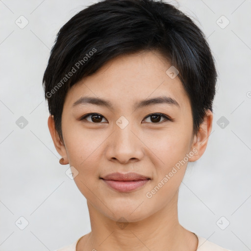 Joyful asian young-adult female with short  black hair and brown eyes