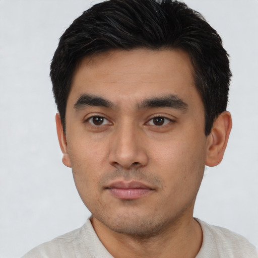 Neutral latino young-adult male with short  black hair and brown eyes