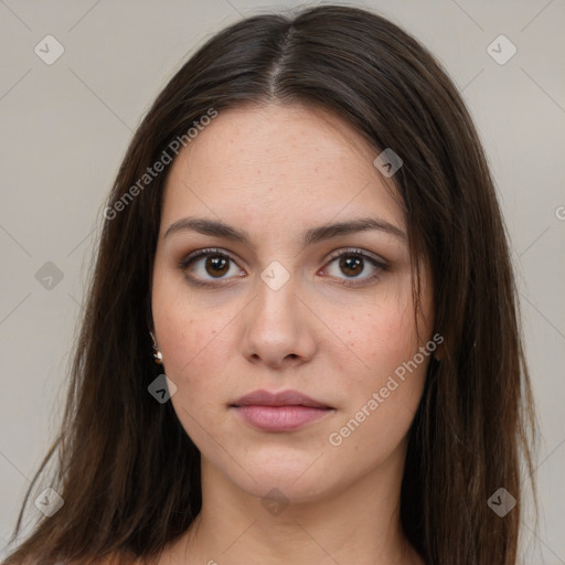 Neutral white young-adult female with long  brown hair and brown eyes