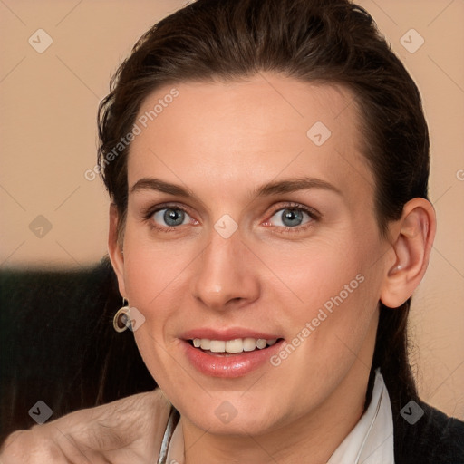 Joyful white young-adult female with medium  brown hair and grey eyes