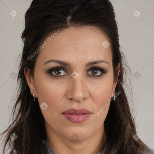 Joyful white adult female with long  brown hair and brown eyes