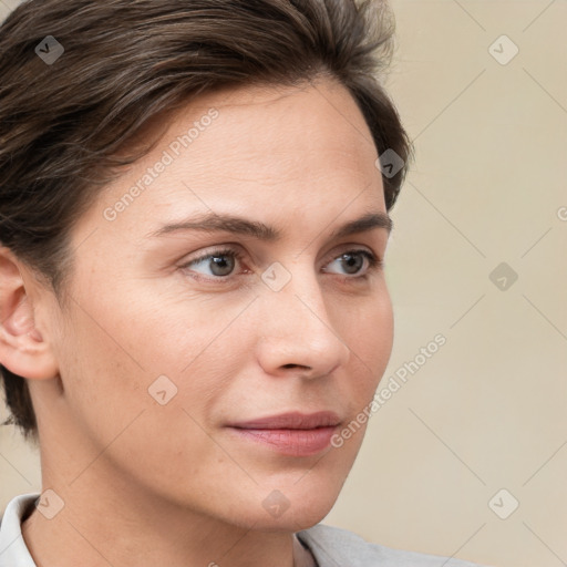 Neutral white young-adult female with short  brown hair and brown eyes