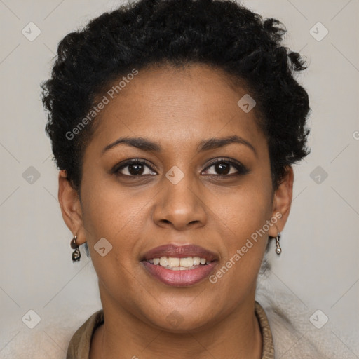 Joyful black young-adult female with short  brown hair and brown eyes