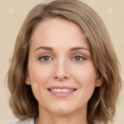 Joyful white young-adult female with medium  brown hair and green eyes