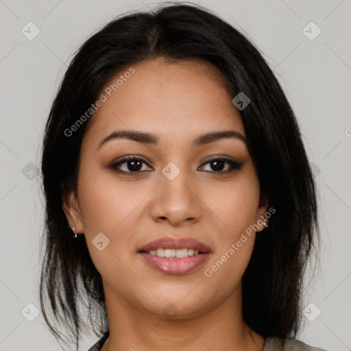 Joyful latino young-adult female with long  brown hair and brown eyes